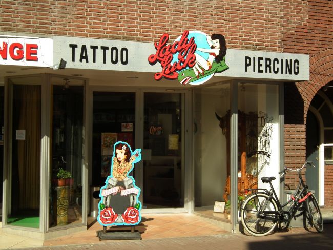 Lady Luck Tattoo en Piercing